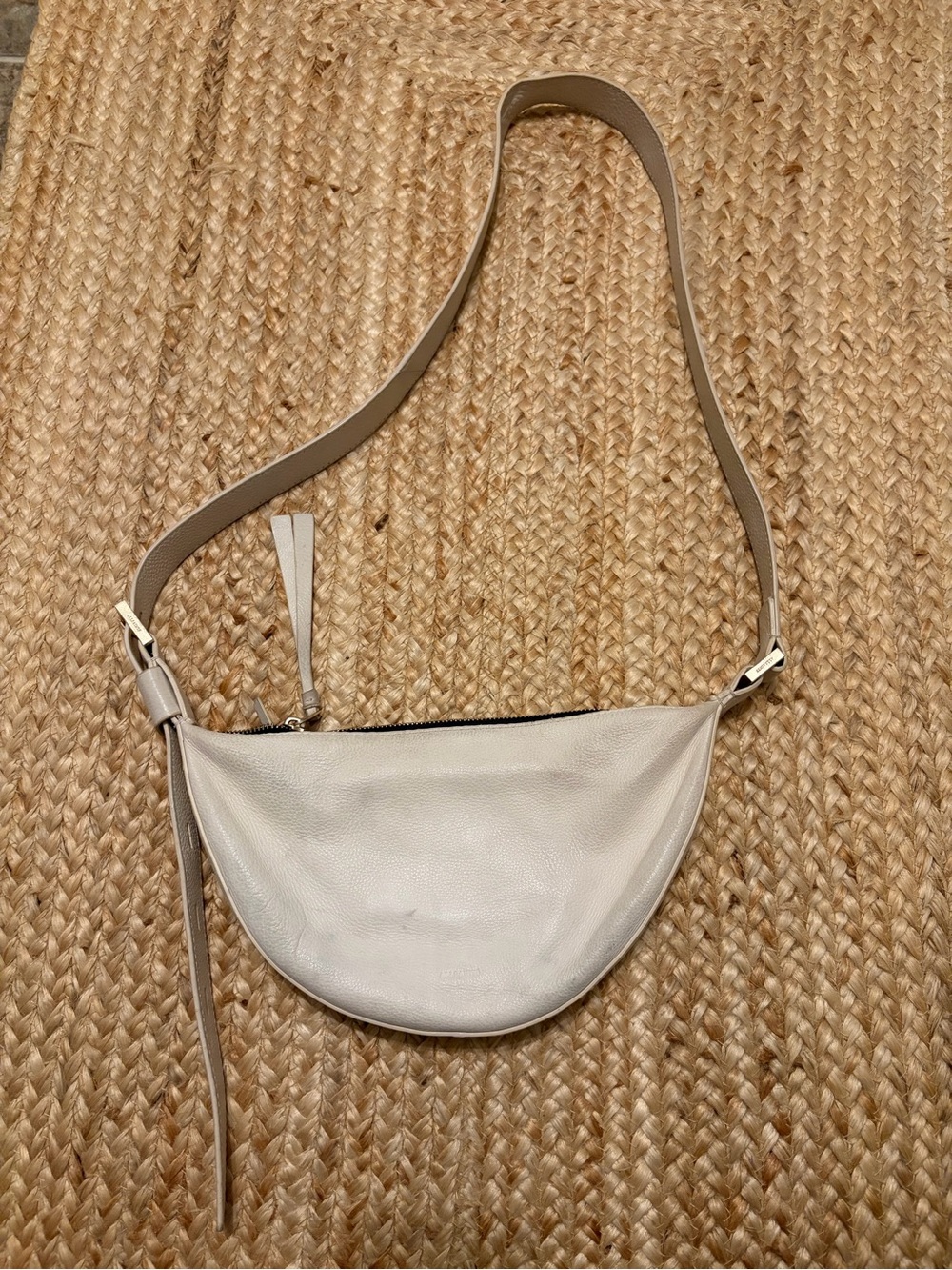 AllSaints Half Moon Crossbody Bag in Cream